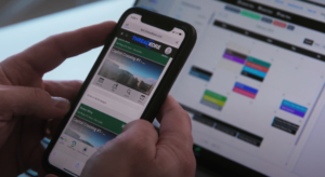 Mobile view of the ThreadKore platform displaying project details alongside a desktop dashboard with scheduling and financial data, illustrating integrated construction accounting services and construction management services in real time.